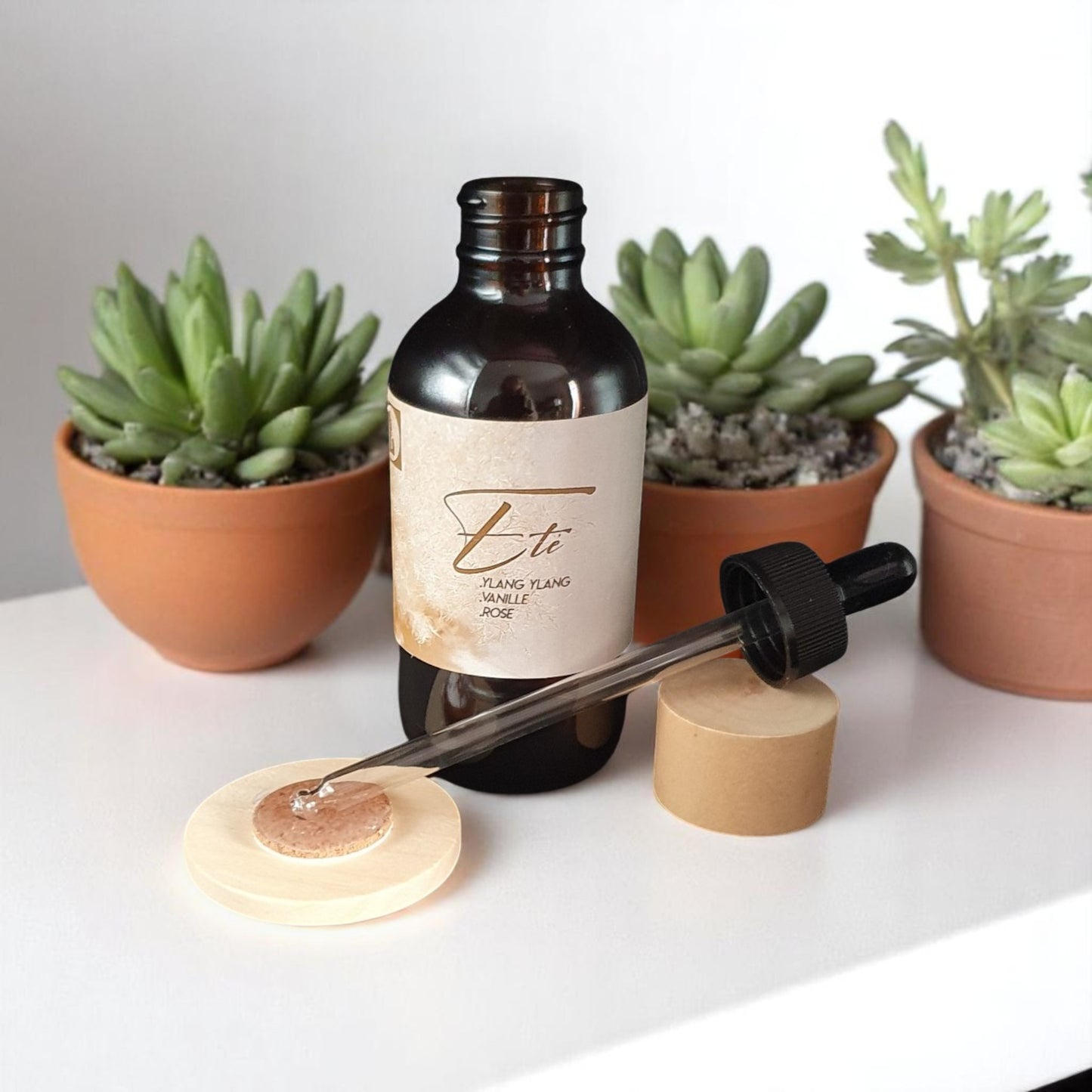 flacon de parfum d'ambiance l'été